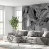 Fotobehang van exotische flora in zwart-grijze tinten Bladeren op grijze achtergrond - belangrijkste productafbeelding