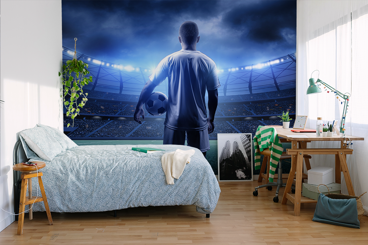 Fotobehang Voetballer in het stadion
