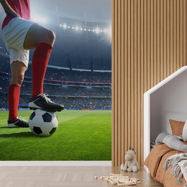 Fotobehang Voetballer op het grasveld