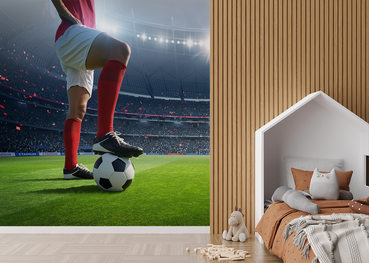 Fotobehang Voetballer op het grasveld
