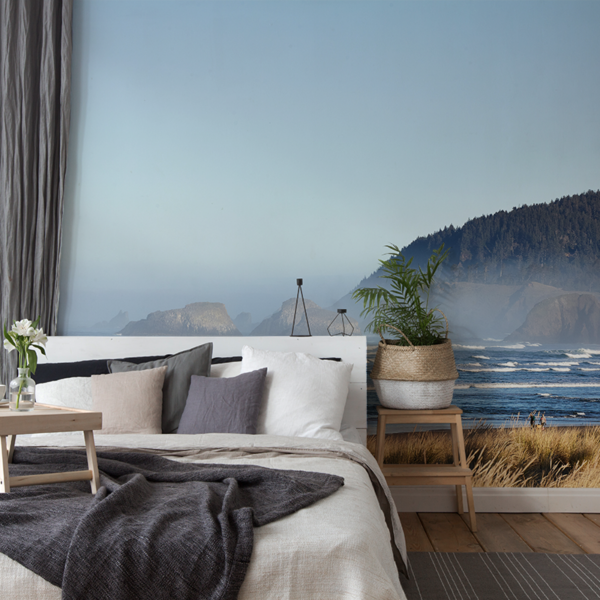 Fotobehang Strand met uitzicht op de rotsen