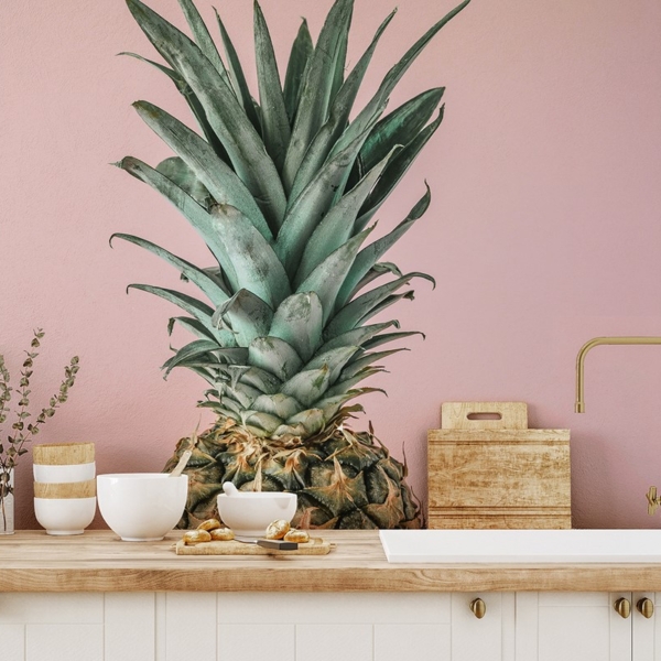 Fotobehang Ananas op een roze achtergrond